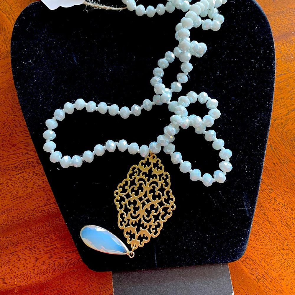 How long beaded necklace with gold accents